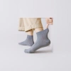A pair of pure cotton mid-calf grey socks for both men and women Application Scenario